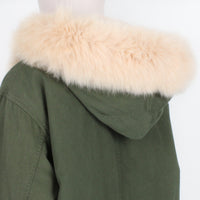 Yves Salomon parka in a khaki green finish with pale blush pink fur lined hood and body