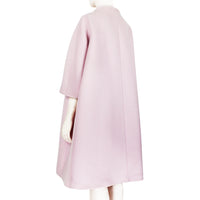 Jil Sander collarless cocoon coat in a luxurious pastel pink wool fabric