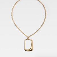 Jacquemus 'The Ovalo' J pendant necklace in a gold tone finish