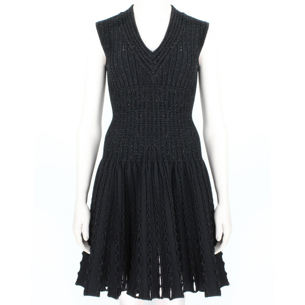 Alaia luxurious skater dress in black and shimmering onyx black
