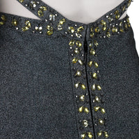 Herve Leger luxurious form fitting dress in a shimmering gunmetal tone