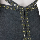 Herve Leger luxurious form fitting dress in a shimmering gunmetal tone