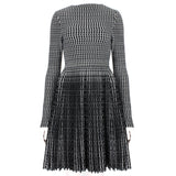 Alaia signature skater dress in a luxurious black and white patterned knit
