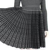 Alaia signature skater dress in a luxurious black and white patterned knit