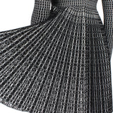 Alaia signature skater dress in a luxurious black and white patterned knit