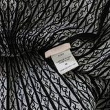 Alaia signature skater dress in a luxurious black and white patterned knit