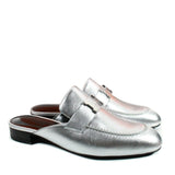 Hermes Trocadero mules in a metallic silver grained leather