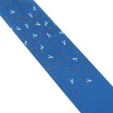 Hermes luxurious silk tie in a rabbit and carrot pattern