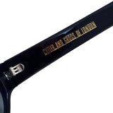 Cutler & Gross 1374 round sunglasses in a translucent navy blue frame