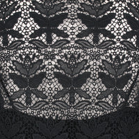 An intricate long-sleeve lace tunic dress in black by Emilio Pucci