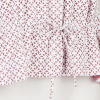 Alaia white laser-cut blouse with pink under layer