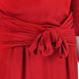 A Giambattista Valli elegant dress in luxurious pillar box red knitted fabric