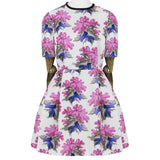 A short dress in a floral pattern by Caterina Gatta