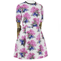 A short dress in a floral pattern by Caterina Gatta