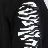 Proenza Schouler black long sleeve top with zebra print sleeves