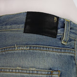 R13 washed Japanese selvedge denim shorts with attached leather leggings
