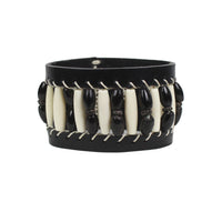 Henry Beguelin black leather cuff with ivory and black resin beading