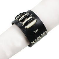 Henry Beguelin black leather cuff with ivory and black resin beading