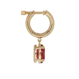 Alexander McQueen gold tone hoop singular earring with ruby red crystal drop. 