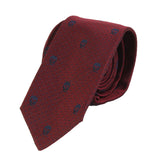 Alexander McQueen narrow silk tie in claret red and navy blue skull and dot pattern