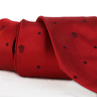 Alexander McQueen red silk black skull and star pattern
