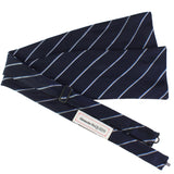 Alexander McQueen woven silk bow tie in a regimental stripe pattern navy blue white