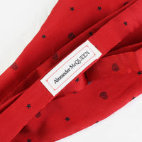Alexander McQueen red and black silk bow tie in a skull and star pattern