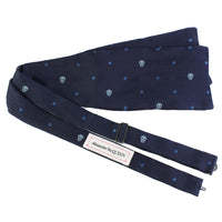 Alexander McQueen navy blue silk bow tie in a skull and dot pattern