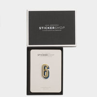 Anya Hindmarch number six embossed leather sticker fron the Stickershop Collection